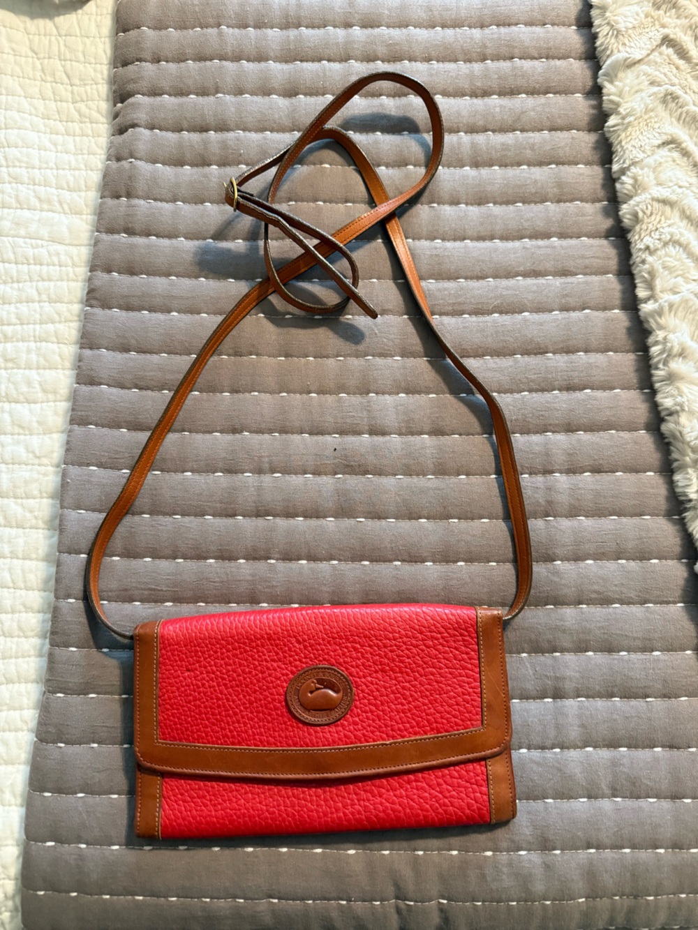 Dooney & Bourke Red and Tan
Crossbody wallet/  Bag